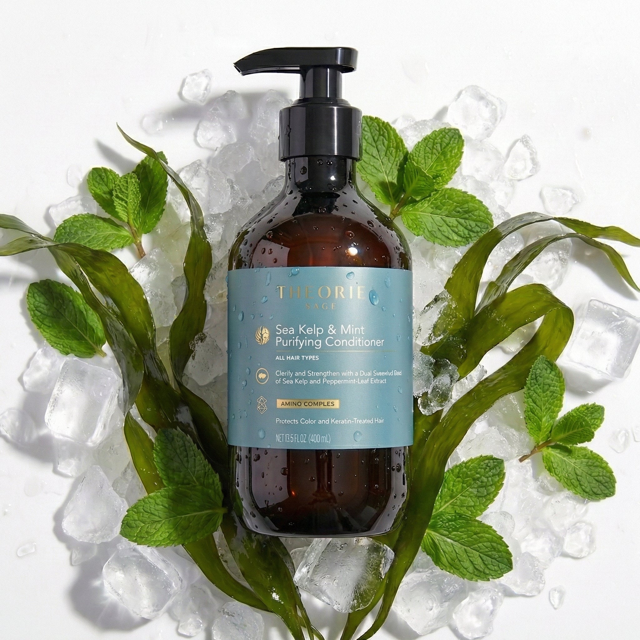 Bottle of 'The Body Shop' Sea Kelp & Mint Purifying Conditioner with green leaves and ice cubes on a white background